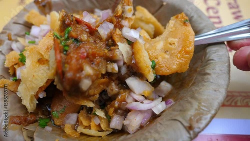 Eating Banarasi Tamatar Ki Chaat in a Traditional Leaf Dona Bowl