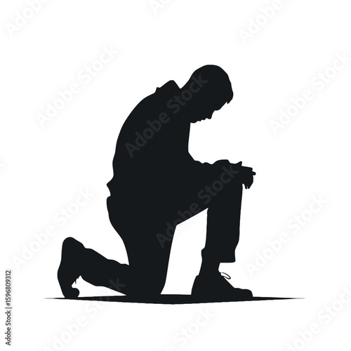 Silhouette of Contemplation: A silhouette of a person kneeling, lost in deep thought and contemplation, representing solitude and introspection.