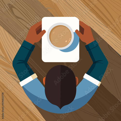 Person holding a cup of coffee from above on a wooden table