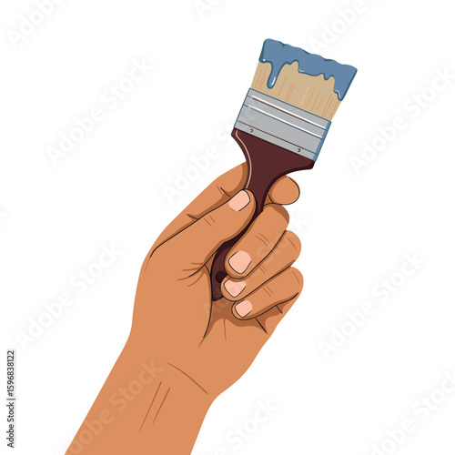 Hand holding paintbrush with blue paint drips  