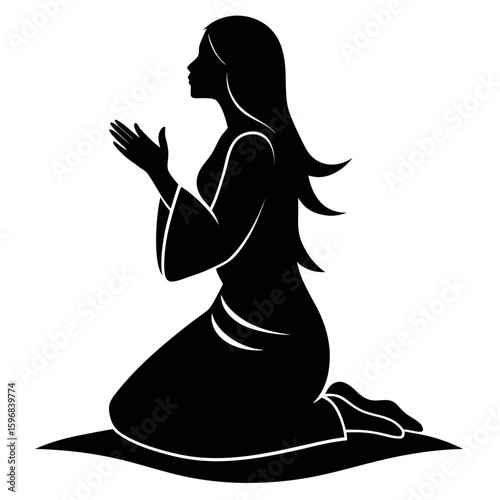 Silhouette of a woman praying on her knees
