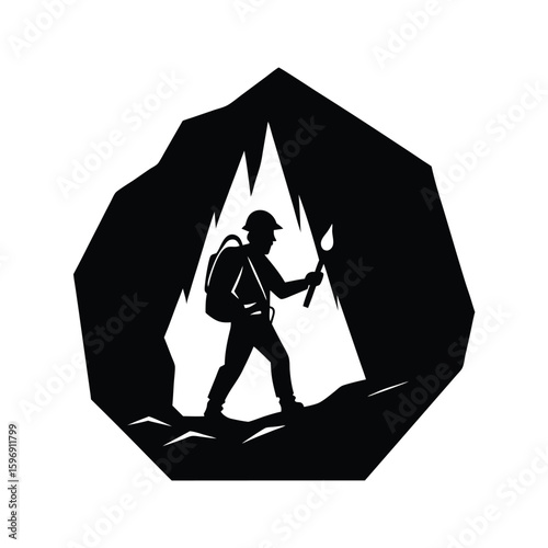 Silhouette of adventurer exploring a dark cave