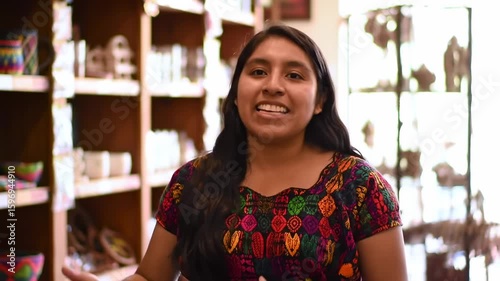 Woman in shop smiles warmly