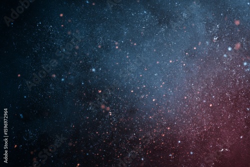 Abstract background with a cosmic dust effect featuring shades of deep blue blending into a dusky rose hue scattered with bright bokeh sparkles