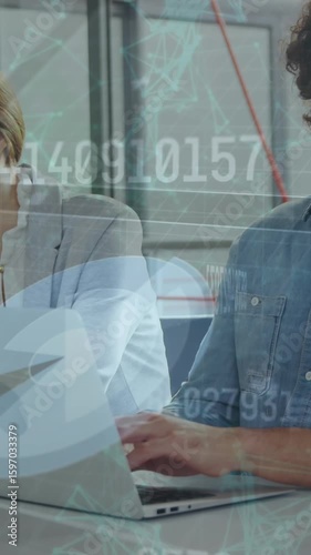 A group of executives using various digital devices in a meeting