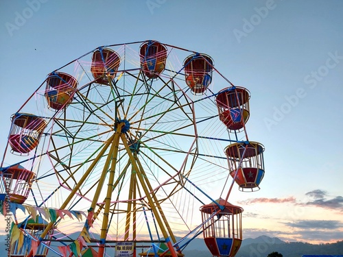 ferris wheel on a blue sky