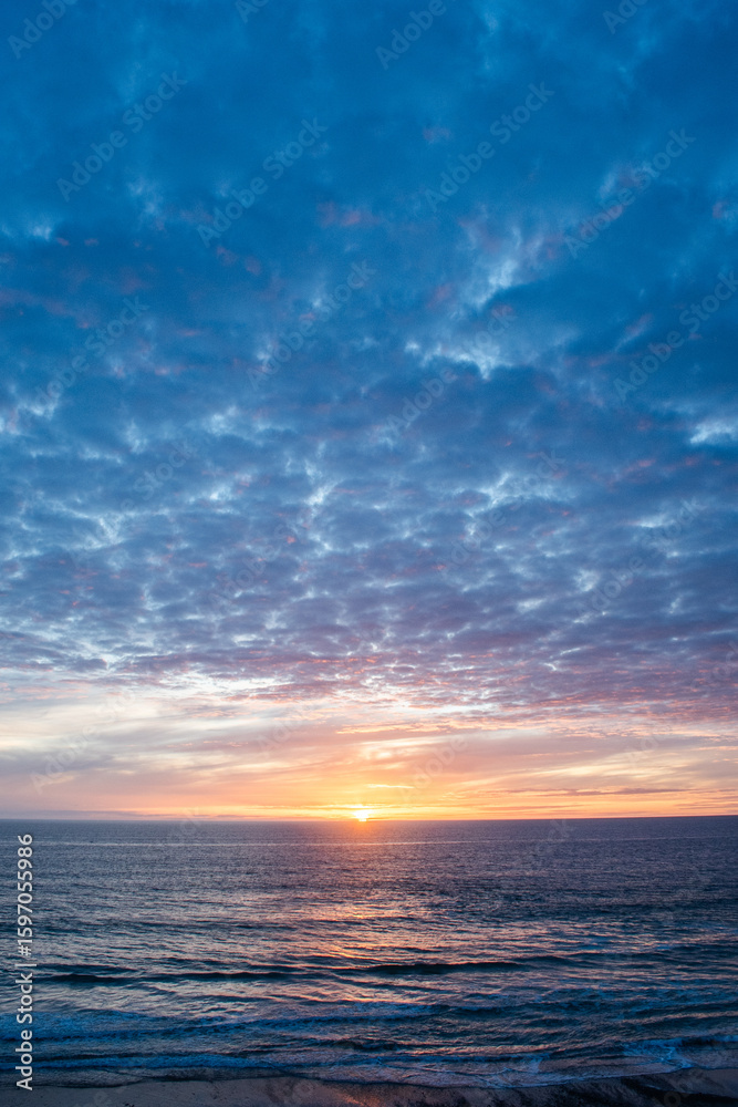 Fototapeta premium Clouds lit from the evening sunset