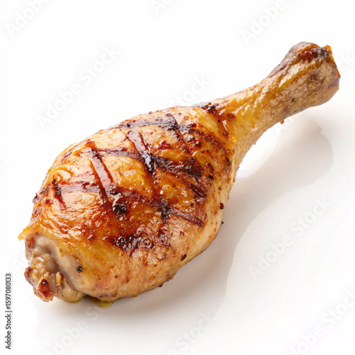 A delicious grilled chicken leg on a white plate, isolated for a perfect meal A high-resolution, isolated photograph of a single grilled chicken drumstick. 