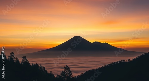 Majestic Volcano Mountain Sunset Scene with Vibrant Colors and Cloud Cover