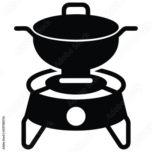 Silhouette of a traditional wok on a portable gas stove