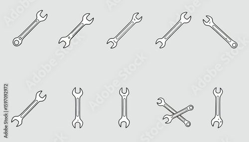 A set of clean line art vector illustrations showcasing various spanner wrenches in different orientations, perfect for mechanical design elements.