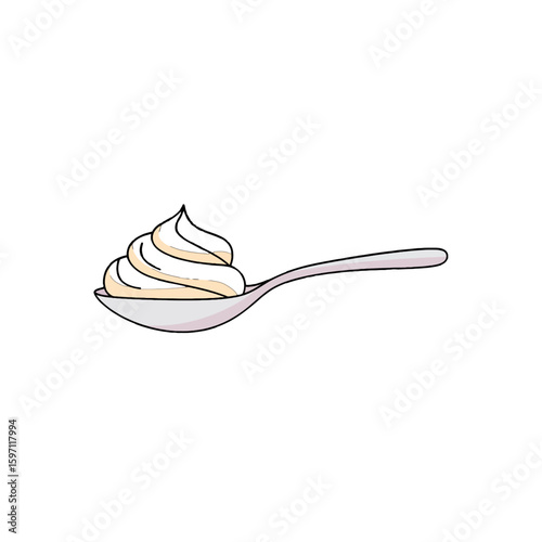 A spoonful of creamy, swirled dessert topping, ready to be eaten.