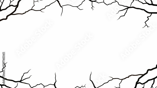 Black branches framing a white space creating a stark and barren winter or halloween themed composition