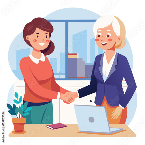 two business women shaking hands