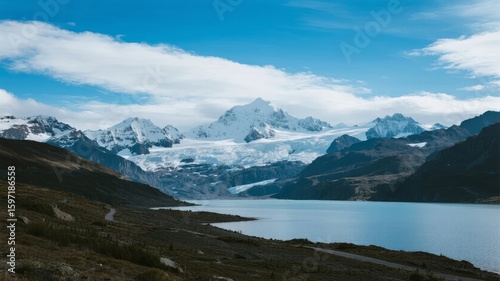 Snow-Capped Mountains and Glacier Overlooking a Calm Lake