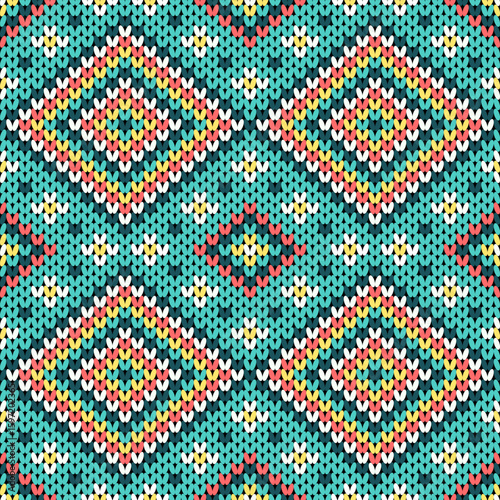 Bright and lively knitted pattern with layered diamond shapes in teal, red, yellow, black, and white. Perfect for textiles, cozy crafts, vintage-inspired, and handmade creative projects.