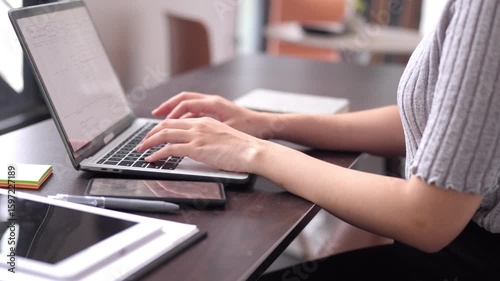 Adult Asian Hands Typing Laptop Keyboard Office Workspace Productive Freelancer Digital Nomad Remote Work Professional Computing Online Business Communication Desk Technology