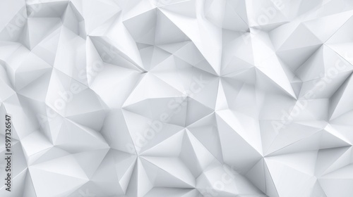 A modern interior design element features a textured white wall with geometric facets and sharp angles, creating a sophisticated visual effect in a contemporary space.