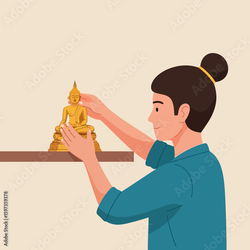 Person Arranging Golden Buddha Statue on Shelf in Home Interior