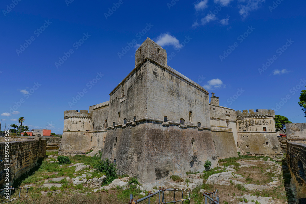 The walls of a medieval castle in Acaya, a village in Lecce province, Italy.. The walls of a medieval castle in Acaya, a village in Lecce province, Italy..