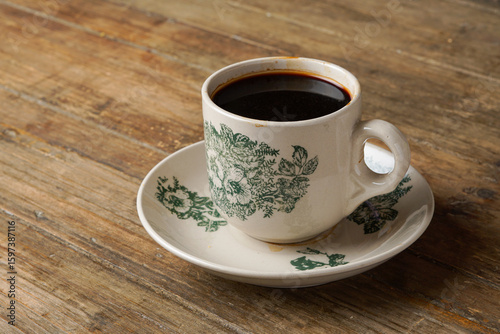 Traditional Black Coffee in Classic Kopitiam Cup on Table for Vintage Malaysian Breakfast Concept
