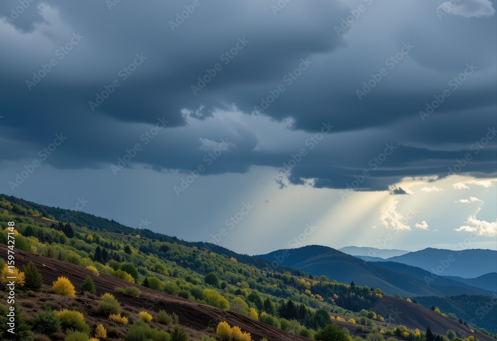 Fototapeta premium storm clouds moving upward along hill triggering rainfall pattern influenced by rising terrain below