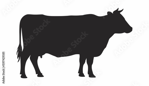 A detailed black silhouette of a cow standing gracefully on a clean white background isolated on white background