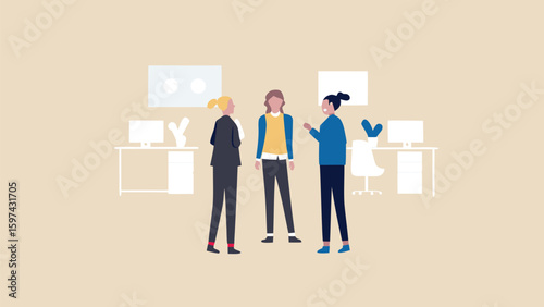 Three business women standing and talking in an office space with desks and computers in the background