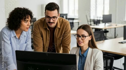 Three colleagues looking at a computer screen in an office environment hd , 4k , mp4 video