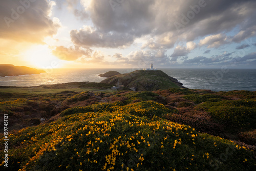 Panoramic View of Strumble Head Lighthouse in Wales with Spectacular Sunset