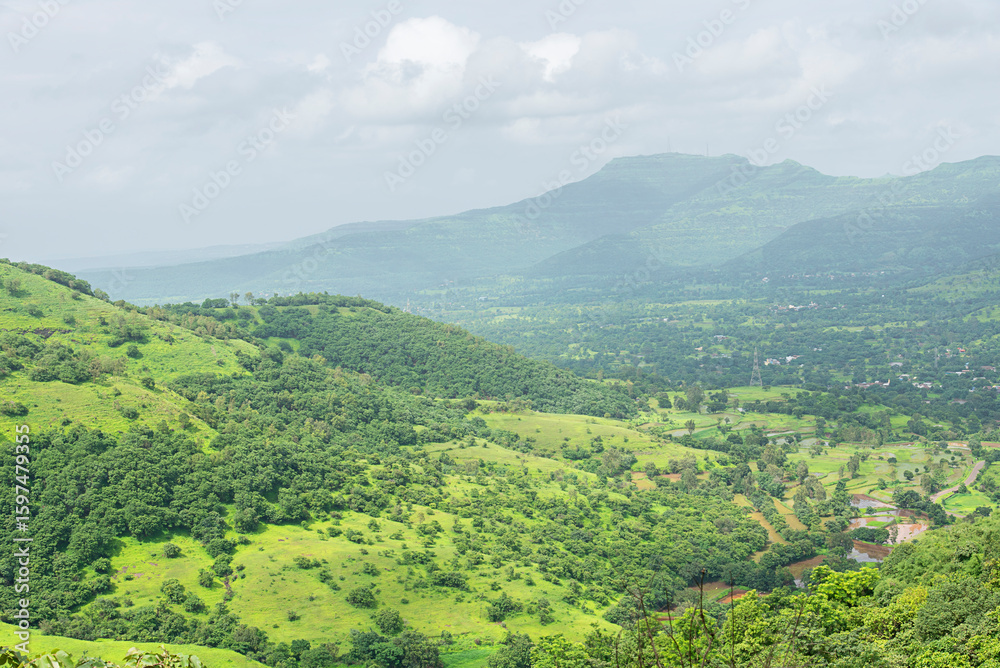 Fototapeta premium Tranquil nature landscape, serene environment, hills of Sahayadri, during monsoon season, nature background for wallpaper, website or poster design, Maharashtra, India.