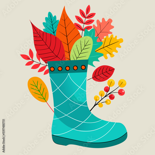 Turquoise rain boot filled with colorful autumn leaves and berries