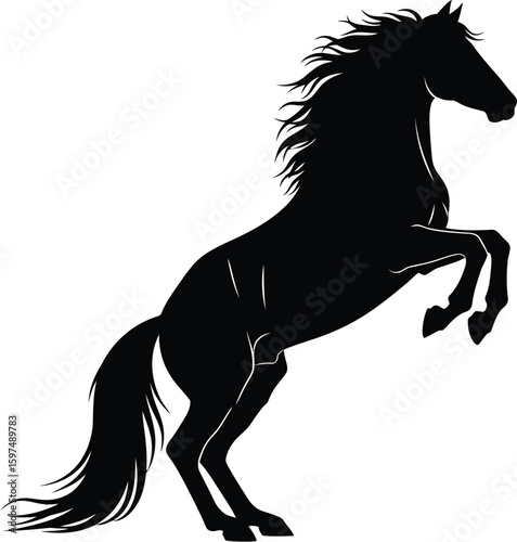 Dramatic black horse silhouette rearing up with flowing mane and tail