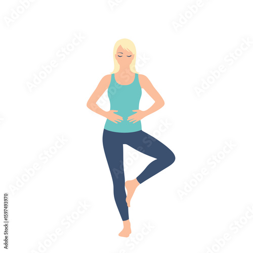 A blonde woman in blue sportswear is practicing yoga, standing in the tree pose with hands clasped near her stomach, isolated on a white background.