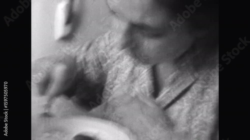 Close up, woman portrait eating homemade soviet food. Hungry adult woman eats dinner quickly in home kitchen. Good healthy appetite. Nutrition lunch indoor. Archival retro film. Archival vintage 1960s