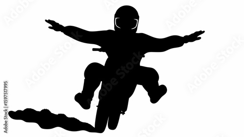 Silhouette of a motocross rider performing a stunt with arms outstretched and dust trail behind bike
