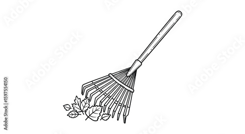 Gardening rake gathering autumn leaves for yard cleanup and seasonal maintenance work