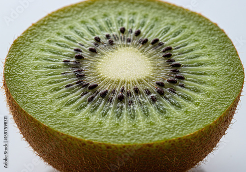 Vibrant Kiwi Slice with Refreshing Water Drops. Healthy Fruit Close-Up with Copy Space