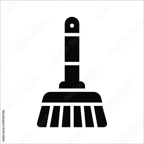 Sleek glyph icon of handheld cleaning brush