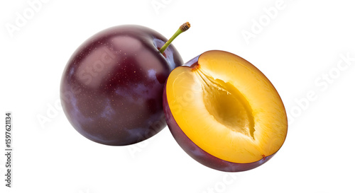 Ripe plums one whole and one halved showing juicy yellow flesh isolated on transparent background