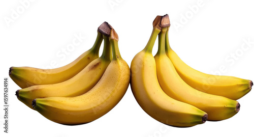 bananas, two bunches of ripe yellow fruit isolated on black.