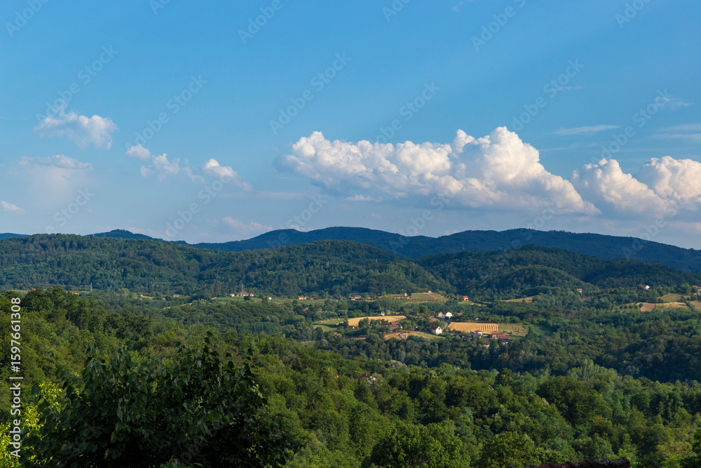 Obraz premium Clouds over low mountains, Balkan landscape