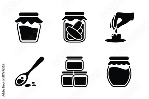 Jars of preserves and spoon with droplets food
