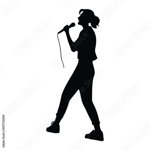 silhouette of female singer performer microphone in hand black confident presence