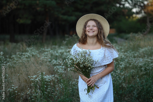 Konstfotografi Smiling girl flowers outdoors. High quality photo