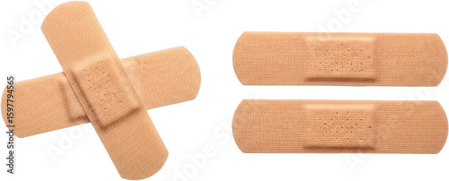 Three tan fabric band aids two side by side one angled over another bandaid transparent background
