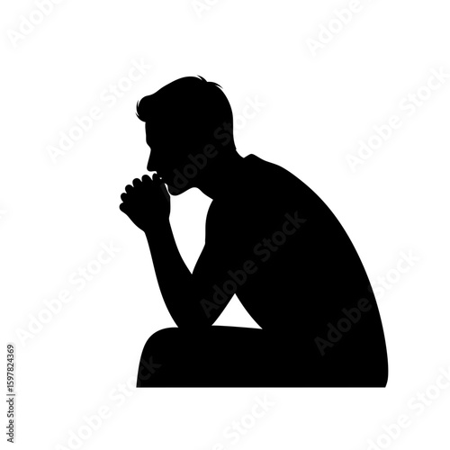 Man Sitting Thoughtfully with Clasped Hands