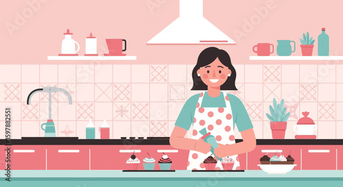 Woman Decorating Cupcakes In A Retro Style Kitchen Baking At Home