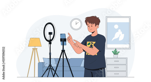 Young Man Creating Content At Home With Smart Phone And Ring Light Set Up