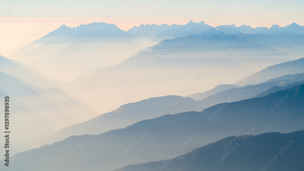 Obraz premium Misty mountain layers at dawn mountains sunrise